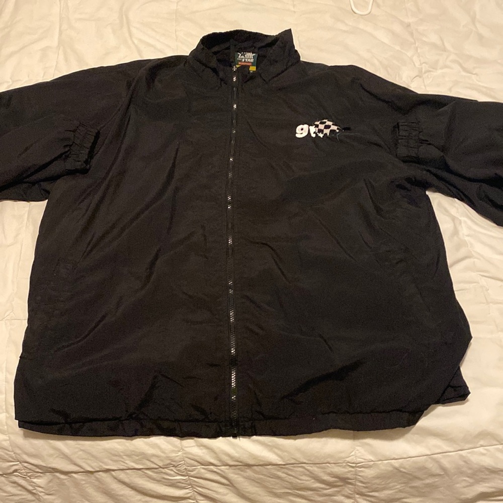 Black windbreaker from local brand